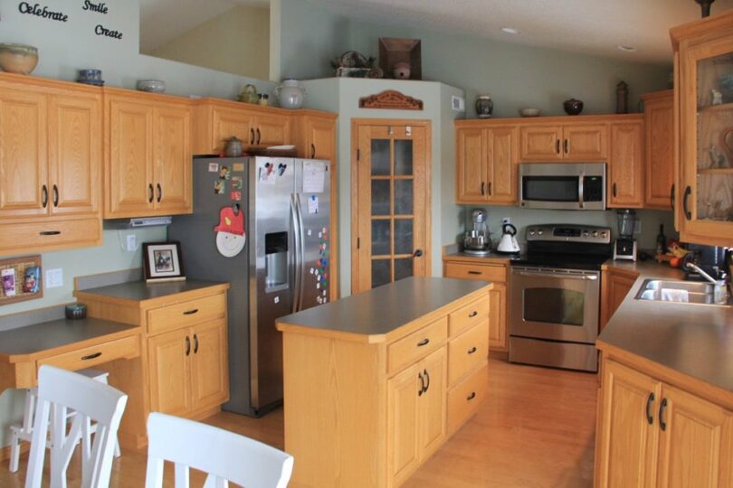 crowded-kitchen-with-outdated-cabinets-before-remodel-fargo-nd