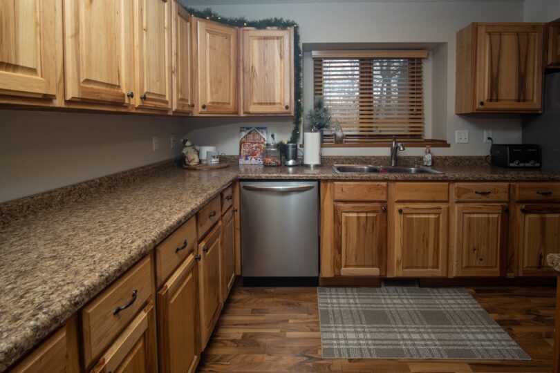kitchen-with-wood-cabinets-feels-dark-and-uninviting-before-homedel-fargo-nd